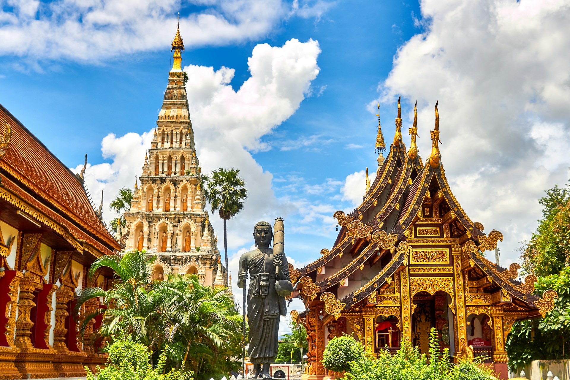 Traditional temple roofs against a blue sky